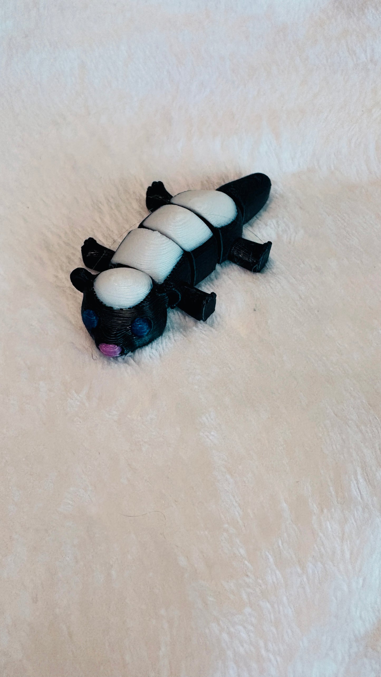 3-D printed articulated Pocket Pet- Skunk