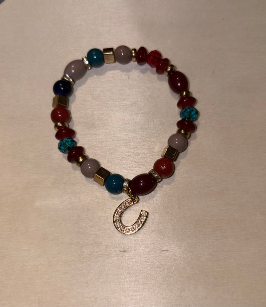 Beaded bracelet with gold rhinestone horseshoe charm handmade