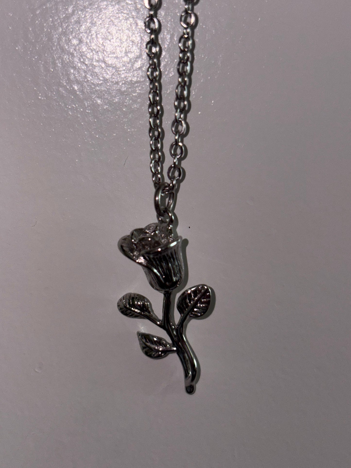 Rose necklace; rose dipped in white gold